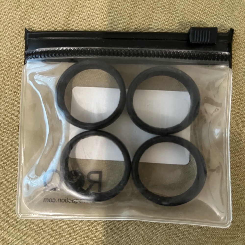 3/15$ - ROQ brand. Set of 4 in a plastic zip pouch.